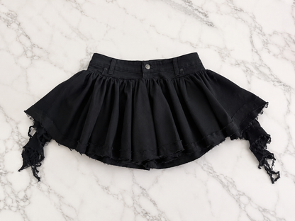 Black knit & denim flared mini skirt with side distressed drape