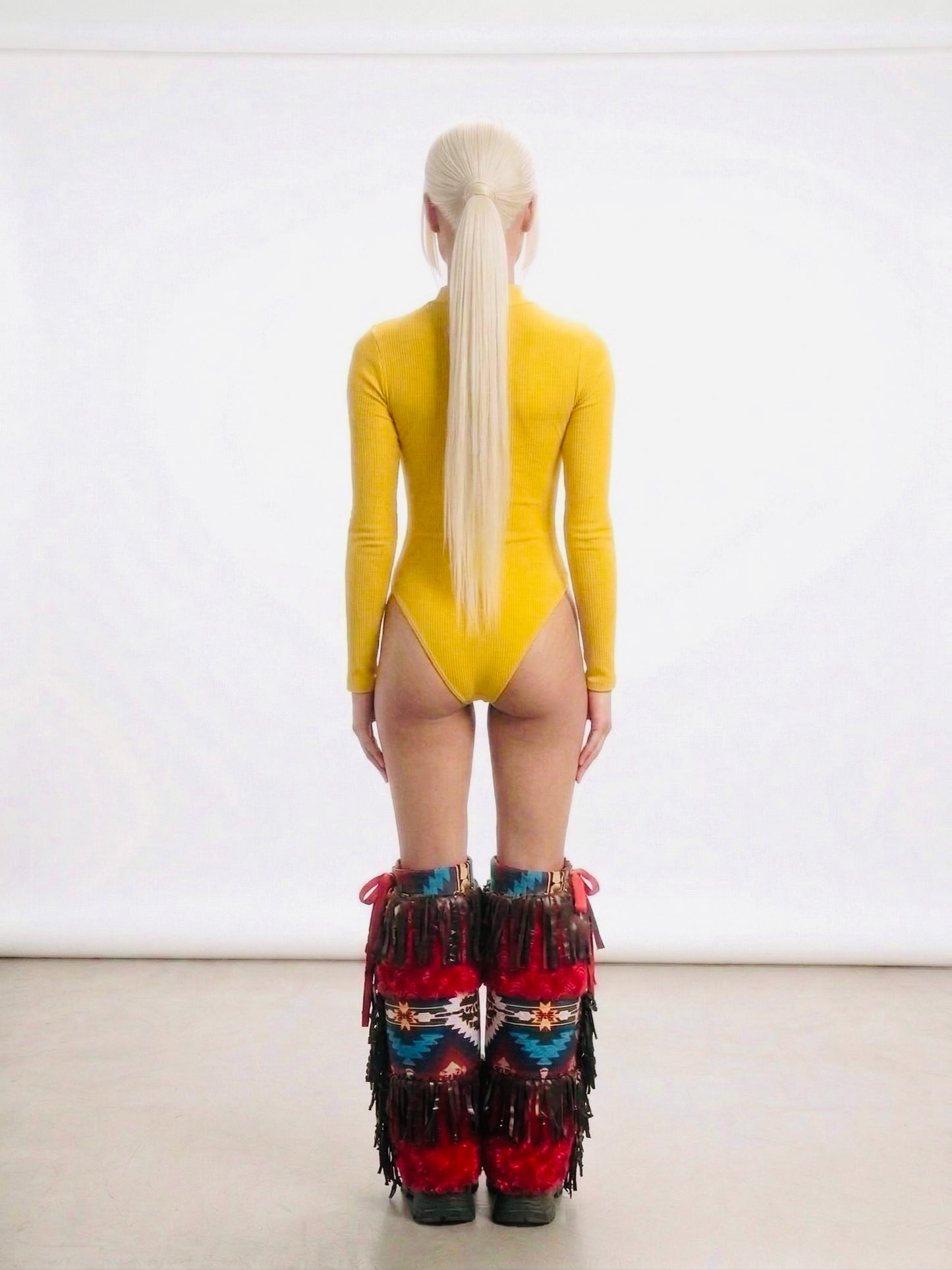 ODESSA Faux fur luxe tribal print and fringe festival & streetwear leg warmers